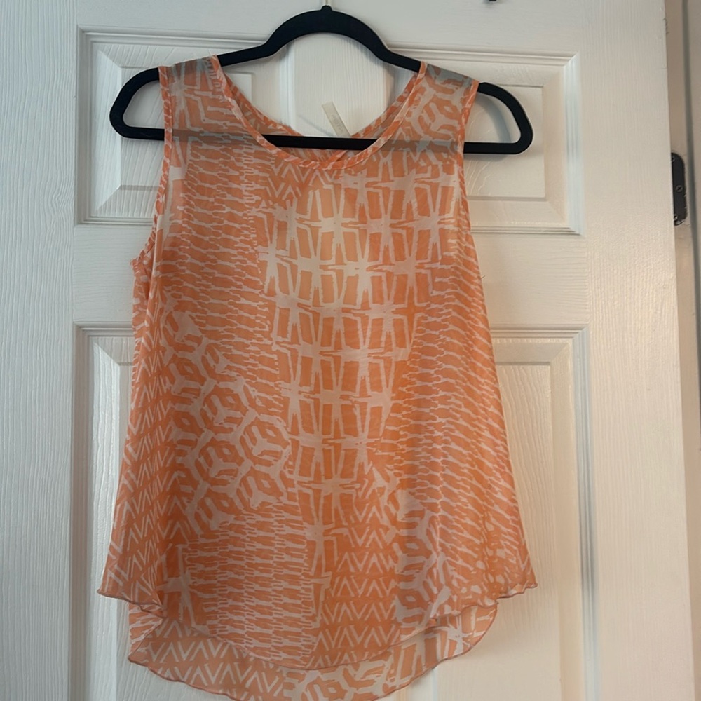 Flowy peach top with cutout back